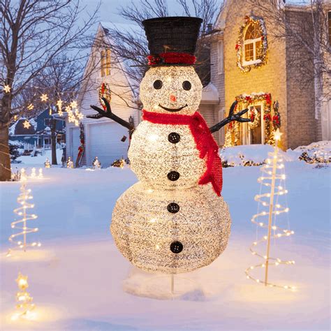 small lighted outdoor snowman|tiny snowman that lights up.